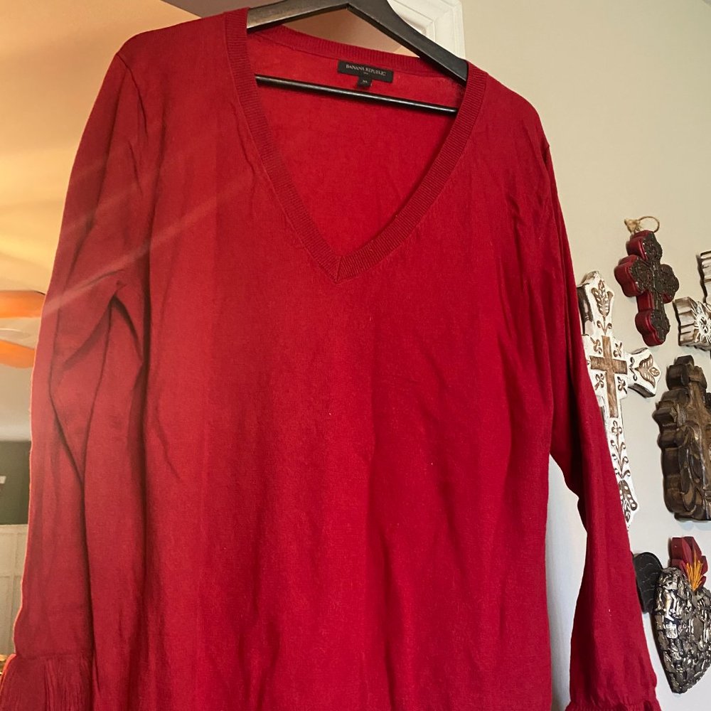 Banana Republic Red Long Sleeve Sweater with ruffle sleeve around wrist, V-Neck
